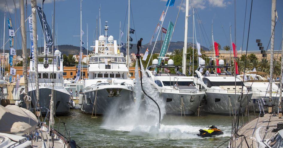 Flyboarding demonstration in front of berthed superyachts at the Palma International Boat Show