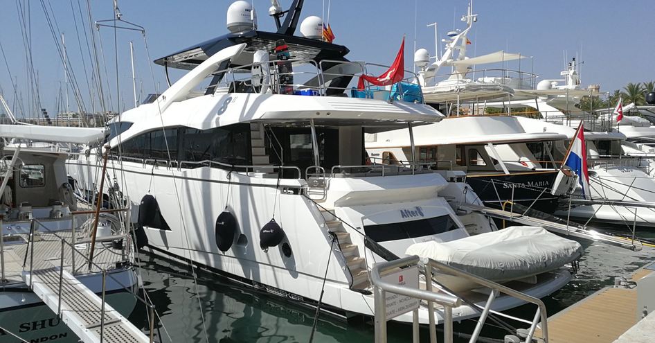 Aft view of motor yacht moored at Marina Moll Vell, during the Palma International Boat Show.