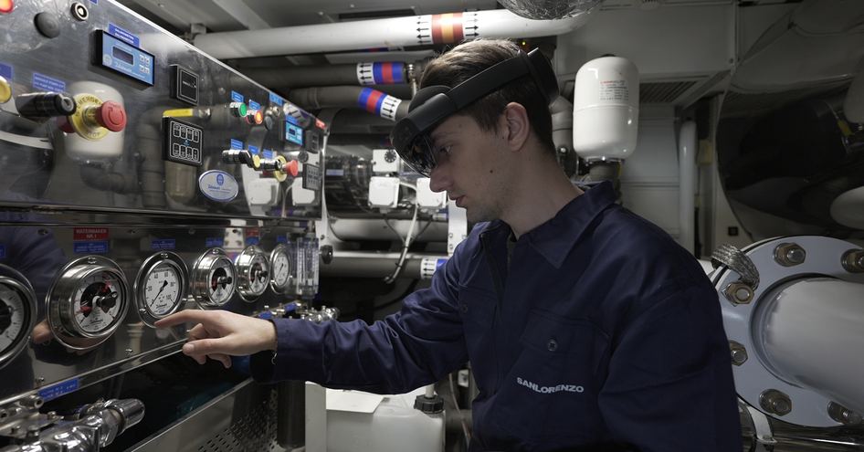 Man wearing Sanlorenzo smart helmet in engine room