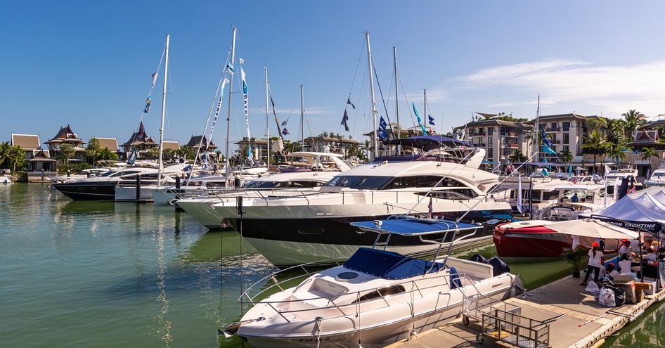 Motor yachts and sailing boats moored in Phuket Boat Lagoon.