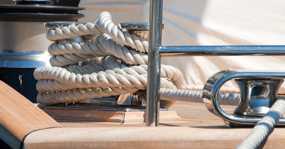 mooring line on cleat running through fairlead