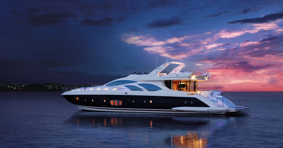 Azimut yacht on water at night