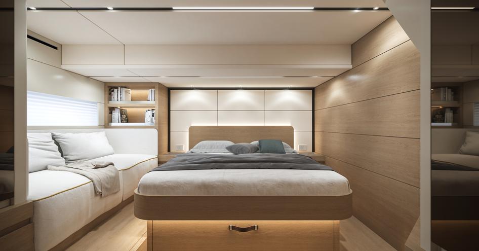 Overview of a double cabin onboard the Solaris Power 52 Open. Central berth with sofa to port side.