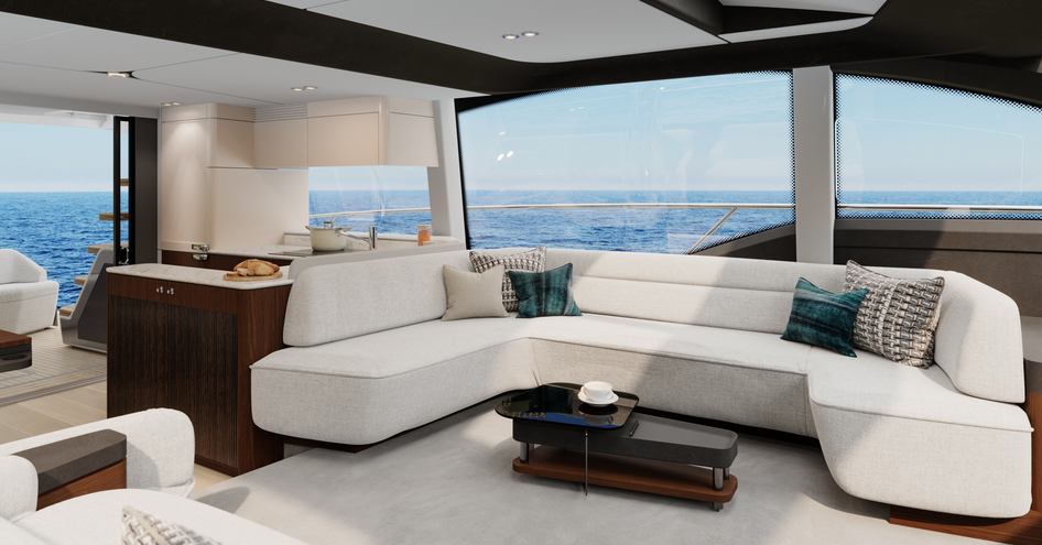 Large sofa in light filled interior of Phantom 65 yacht