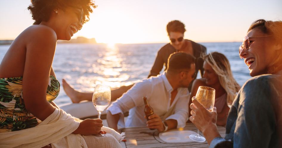 people relaxing on deck in the evening 