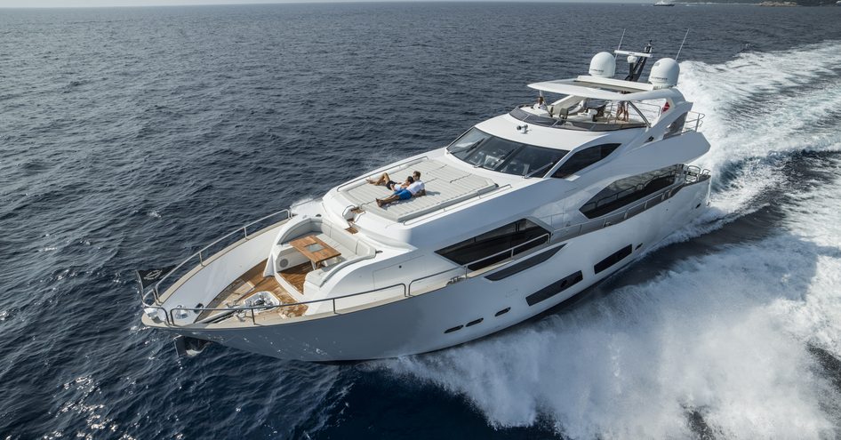 Overview of Sunseeker 95 Yacht underway, surrounded by sea.