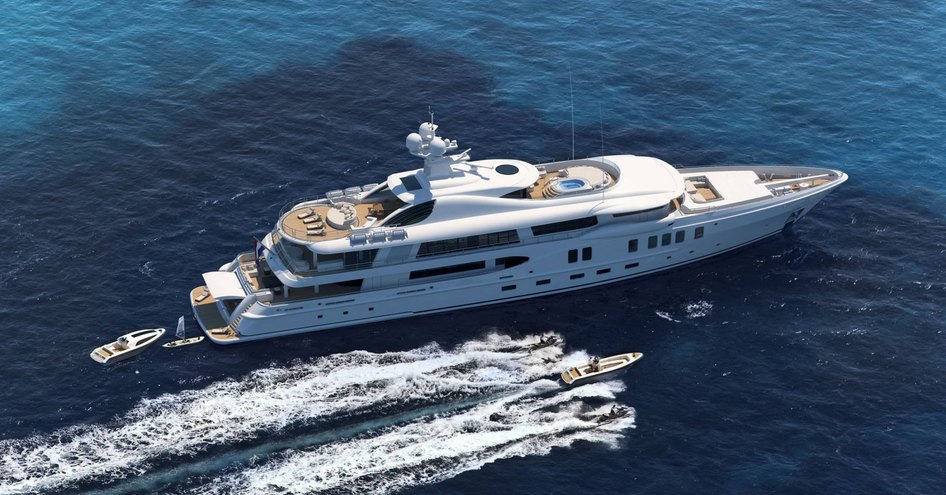 Large motor yacht on sea with tenders alongside, viewed from above