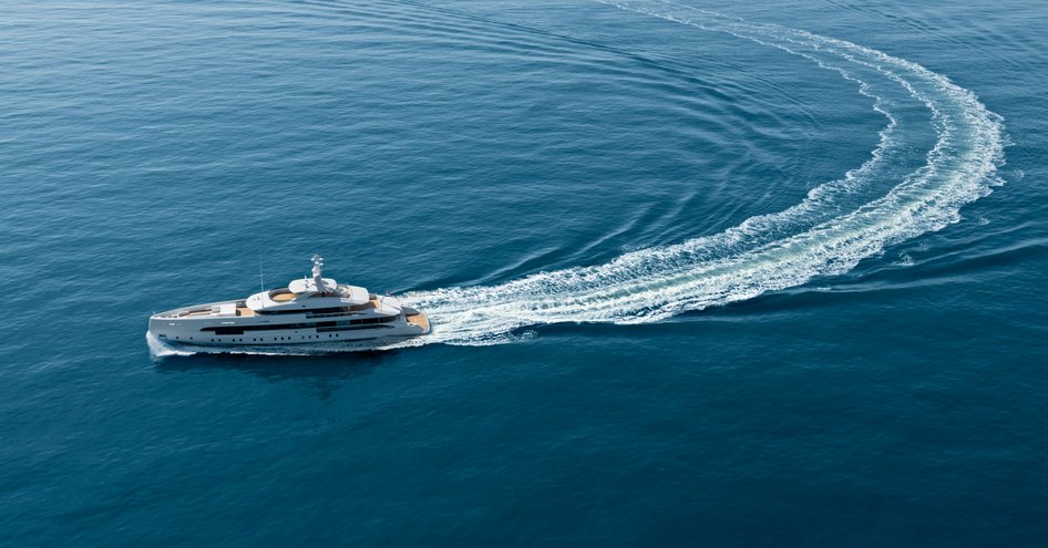 Distant aerial view of Heesen AMARE II at sea