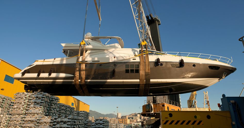 yacht being lifted for transportation