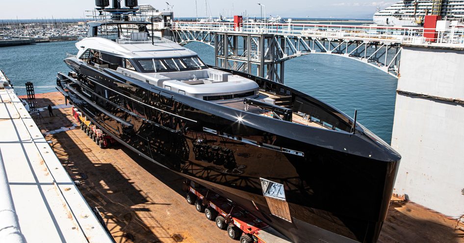 Olokun being reversed into the water ahead of its launch