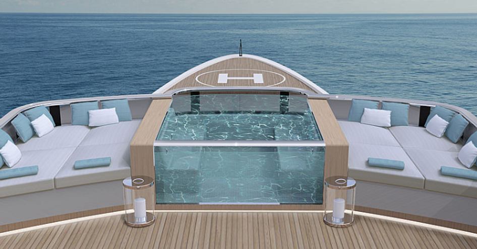 forward section of the sundeck with spa pool and sunpads looking over helipad on the foredeck on board a Continental yacht model