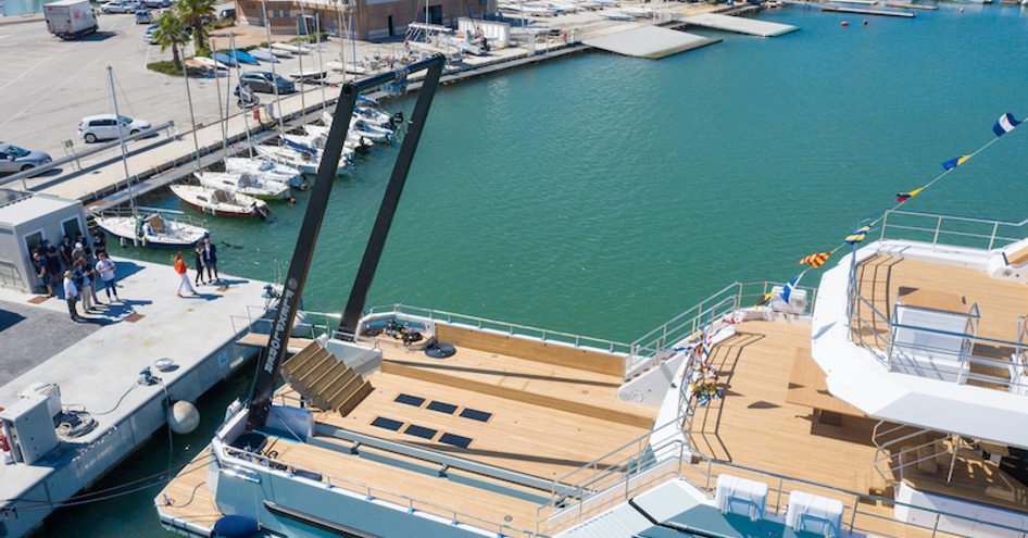 A frame crane onboard CdM AURELIA Flexplorer yacht, surrounded by sea