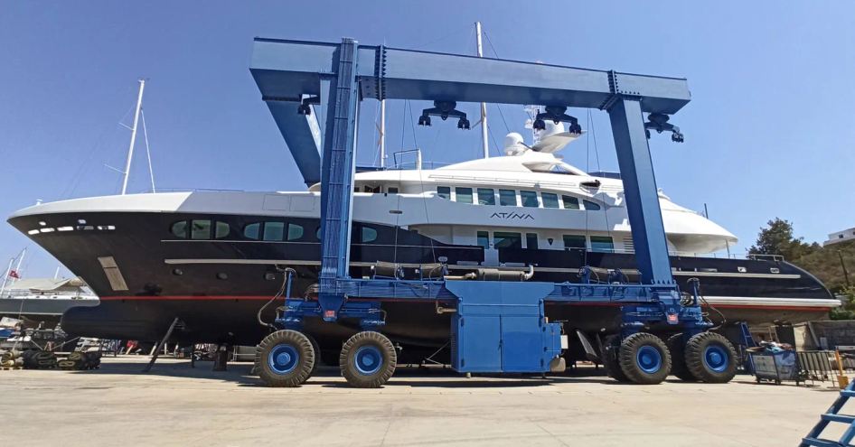 Heesen superyacht ATINA suspended on crane before being launched into the water.