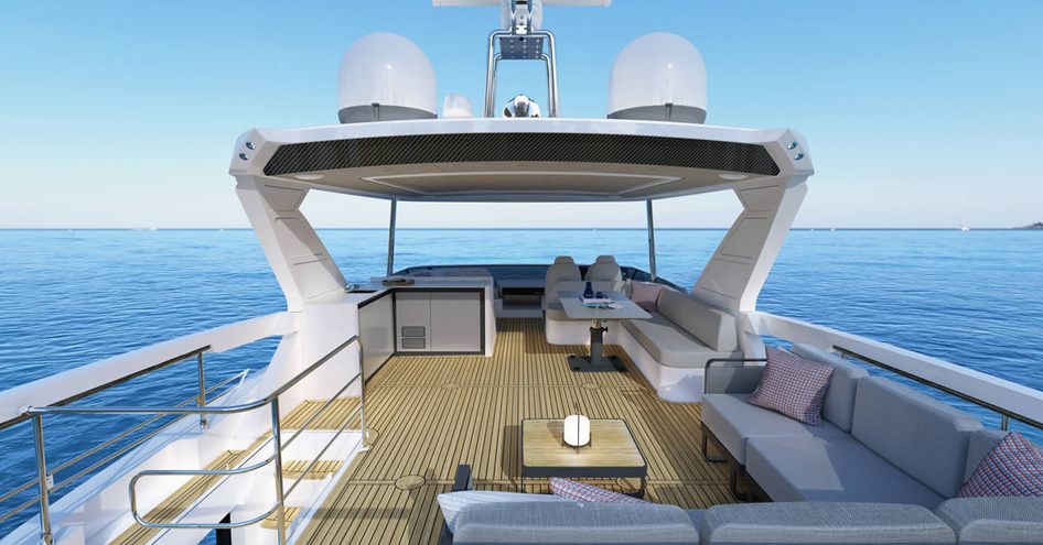 The flybridge onboard the Navetta 62 features lots of seating and a helm station