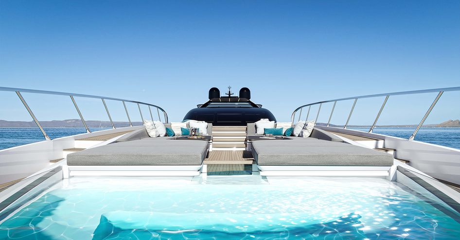 Overview of Mangusta 165 REV foredeck, infinity pool in foreground with sun pads and bridge aft.