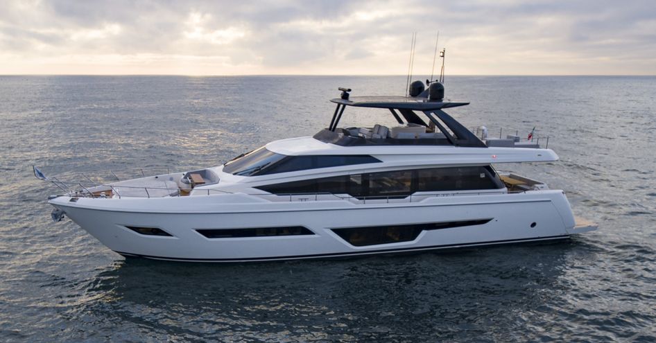 Ferretti Yachts 780 at anchor, surrounded by sea.