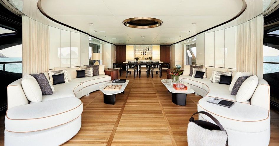 Lounge area on Benetti Oasis 40M with lightly colored sofas