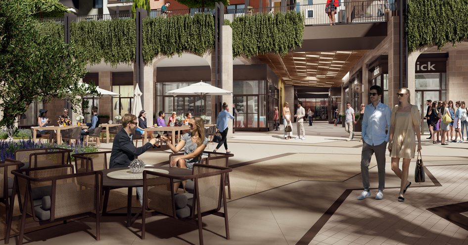 Shopping precinct in Boka Place, Porto Montenegro development. People sat at tables with drinks and others walking around window shopping.