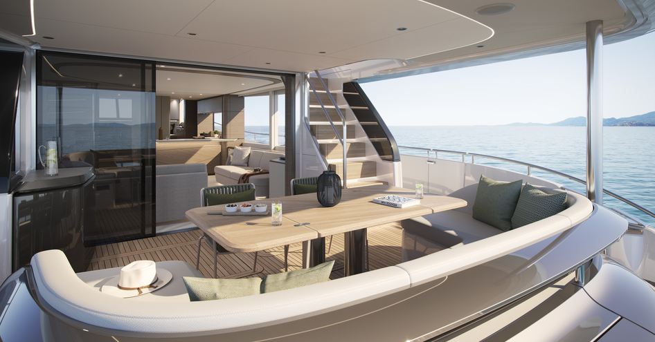 The main deck aft has an exterior dining area and a tender garage.