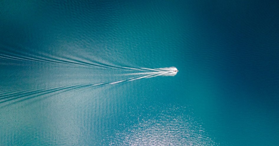 aerial view of yacht offshore on passage to international waters