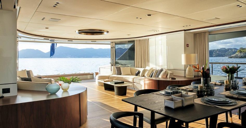 Light and airy interior on Benetti Oasis 40M with door open to outside deck