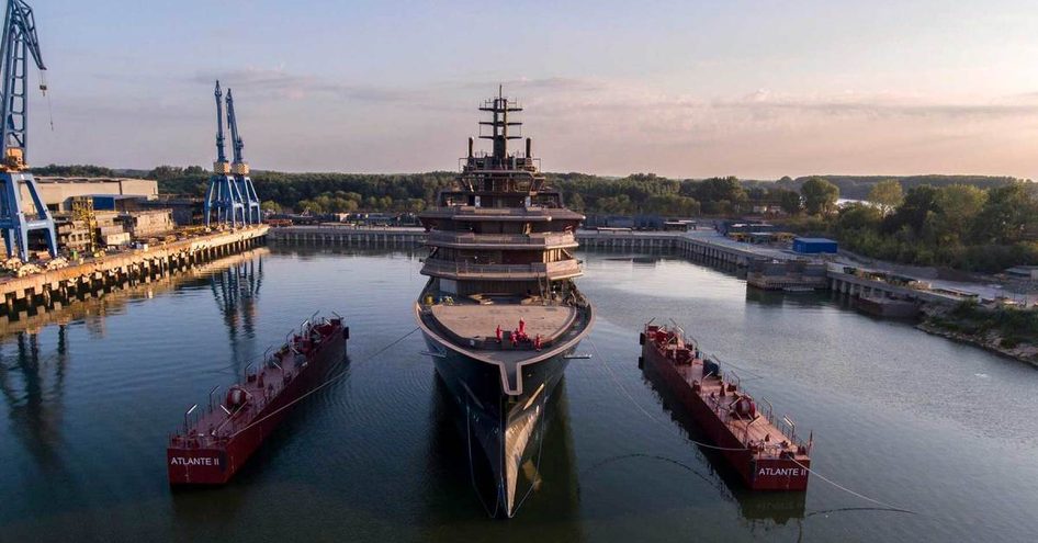 REV Ocean with boats either side on sea trials