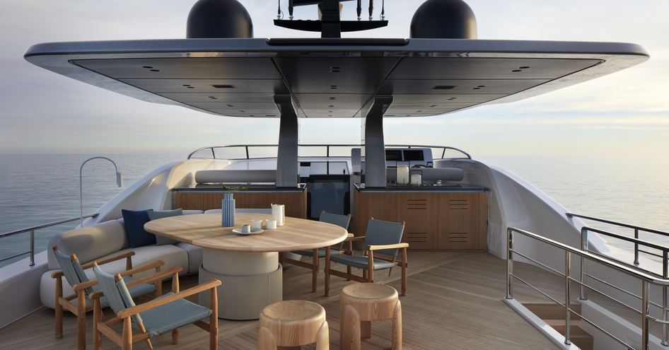 Overview of Sanlorenzo SD90 upper deck with alfresco dining option overlooking sea in all directions.