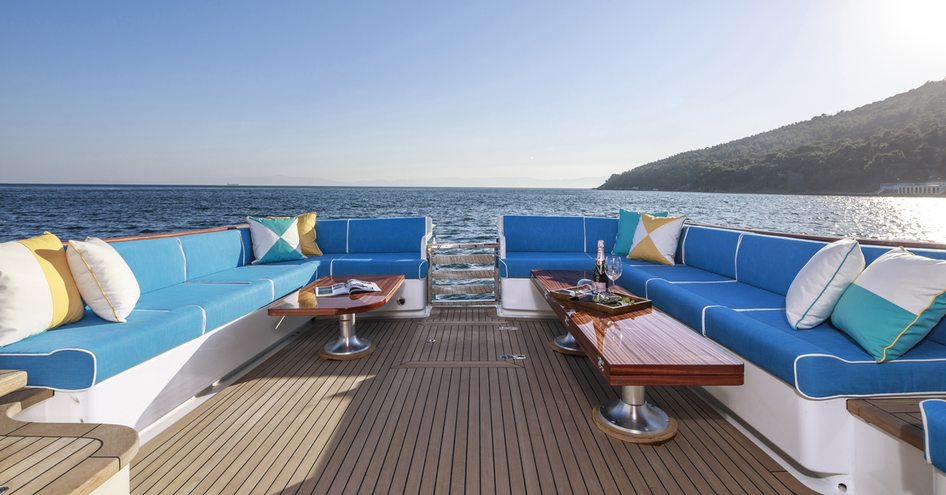 Bridge deck seating with view of sea on superyacht ALECTO