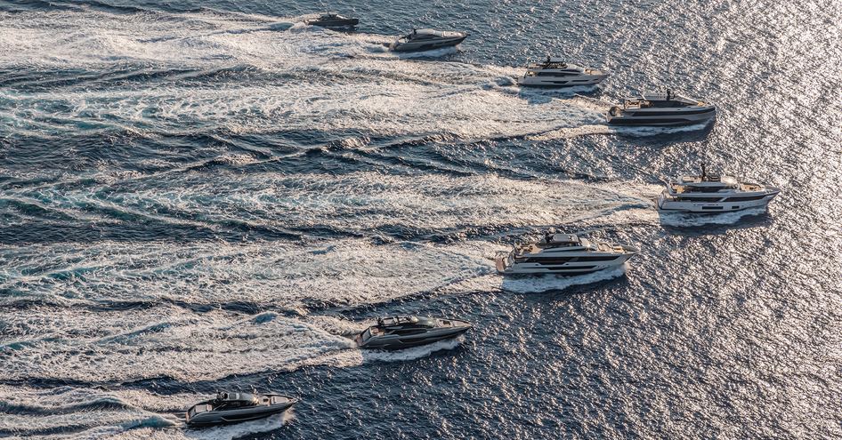 Fleet of Ferretti Yachts on water