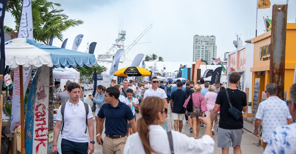 FLIBS exhibitors and visitors exploring on foot