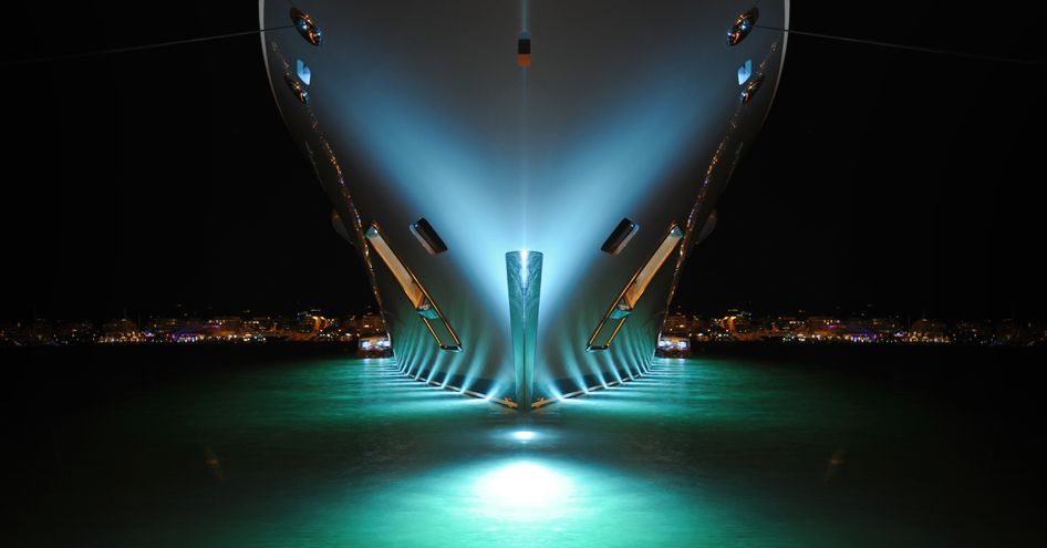 superyacht bow water level at night