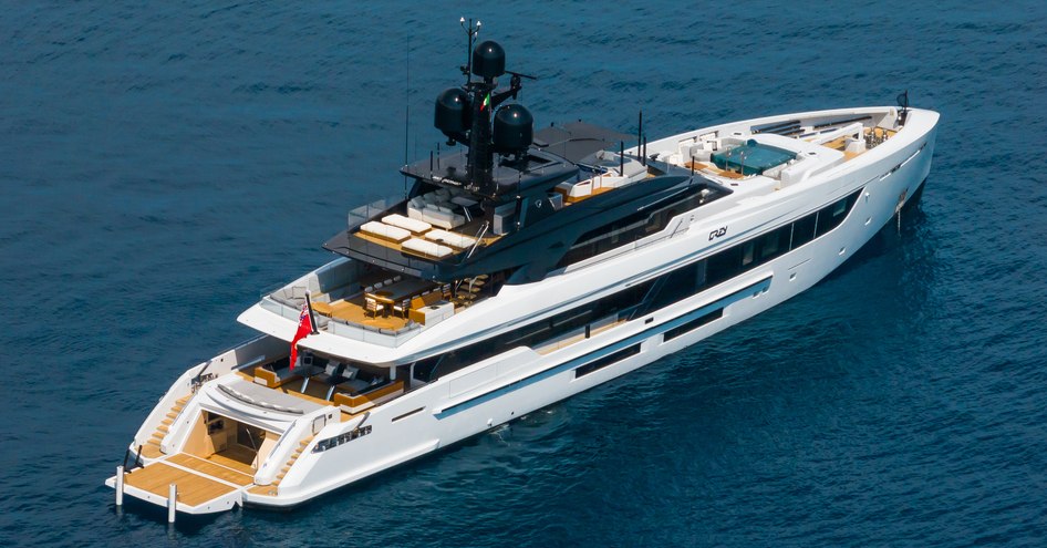 Motor yacht JIMMY at anchor with its fold down swim platform