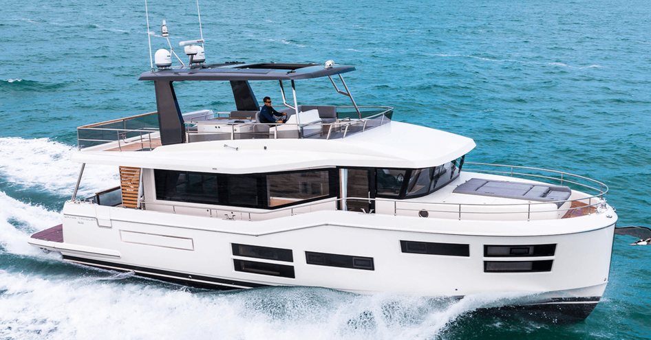 Beneteau Grand Trawler 62 underway, surrounded by sea.