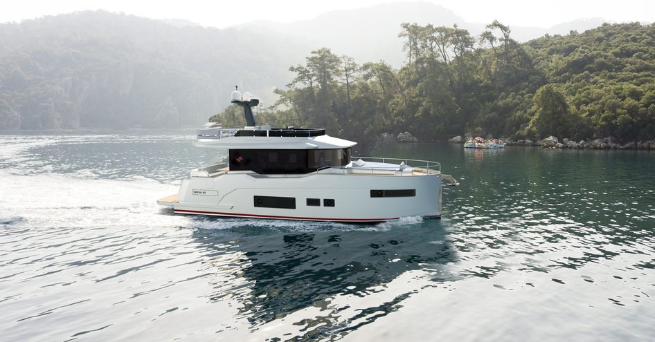 Side view rendering of the Sirena 48, surrounded by sea and green foliage in the background.