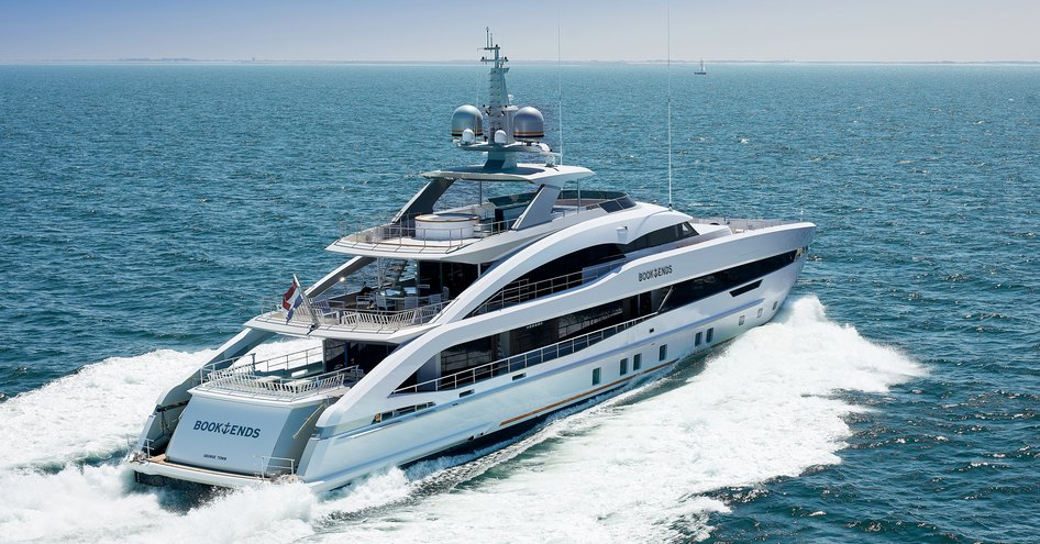 Aft view of Heesen superyacht Book Ends, surrounded by sea. 