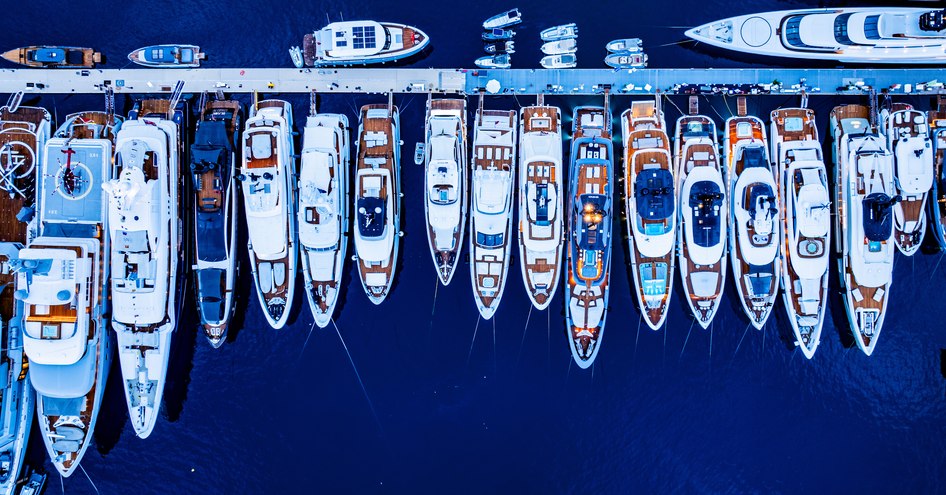 A collection of superyachts at berth in Monaco Port Hercule