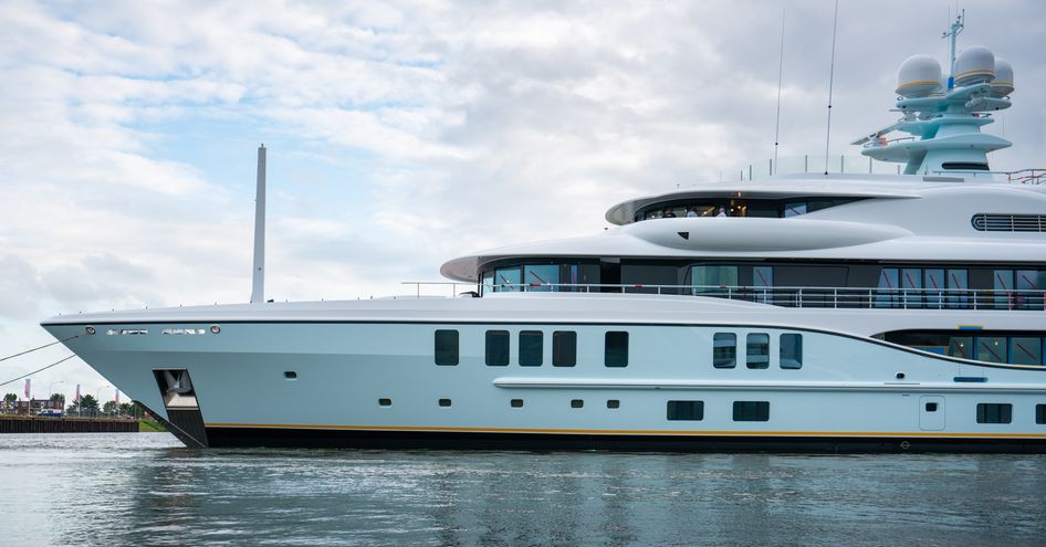 View of Amels 242 superyacht Project Shadow from side on water