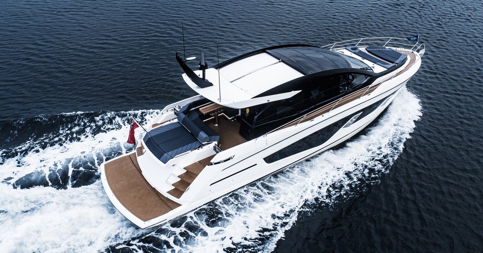 The Predator 65 exterior combines tinted glazing, carbon fiber and polished stainless steel.