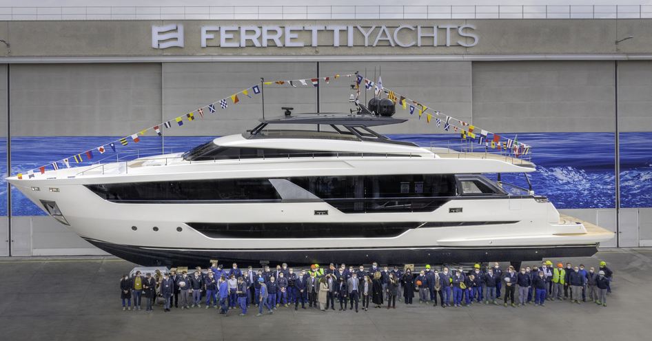 Ferretti Yachts 1000 outside Ferretti yard with staff in front of it